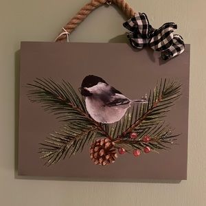 Handcrafted chickadee picture on wood.